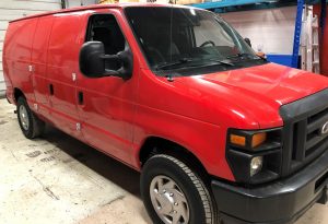Vinyl Wrap Toronto Ford E150 2014 Removal Red White Van Before Side2