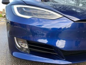 Vinyl WrapToronto Tesla Brushed Black Model S After Decals Front - Chrome Delete Cost