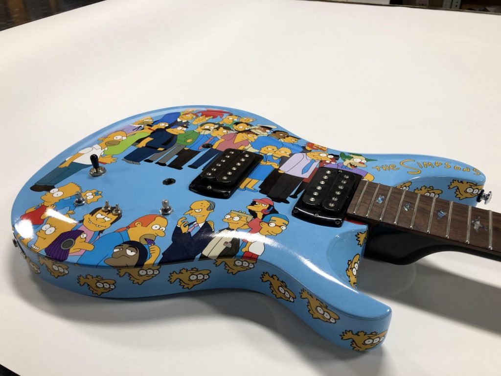 Full Wrap Cost - Recreational - Guitar - The Simpsons Guitar Front Side After Blue Electric - Vinyl Wrap Toronto - 3M