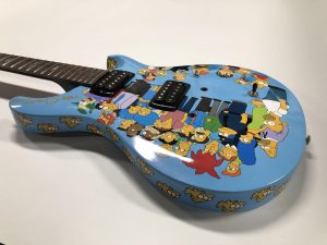 Full Wrap Cost - Recreational - Guitar - The Simpsons Guitar Top Side After Blue Electric - Vinyl Wrap Toronto - 3M