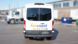 Ford Transit 2018 - Promotional Decals and Lettering - Aerospot - Parking Near Toronto Airport - Avery - Back - Vehicle Wrap cost