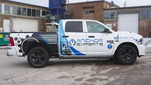 Partial Wrap - RAM 1500 - Avery Dennoson - Anchor Experts - Passenger Side