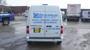 Lettering & Decal - Ford Transit - Avery Dennison - Let Me Upgrade - Back View