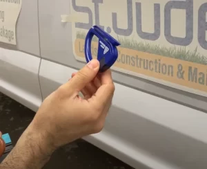 VWT employee holding a cutting tool
