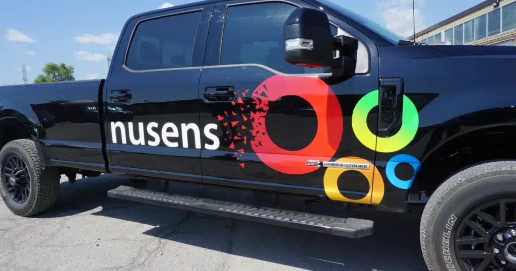 Nusens Ford F150 truck decals after the installation outside of Vinyl Wrap Toronto, passenger side view.