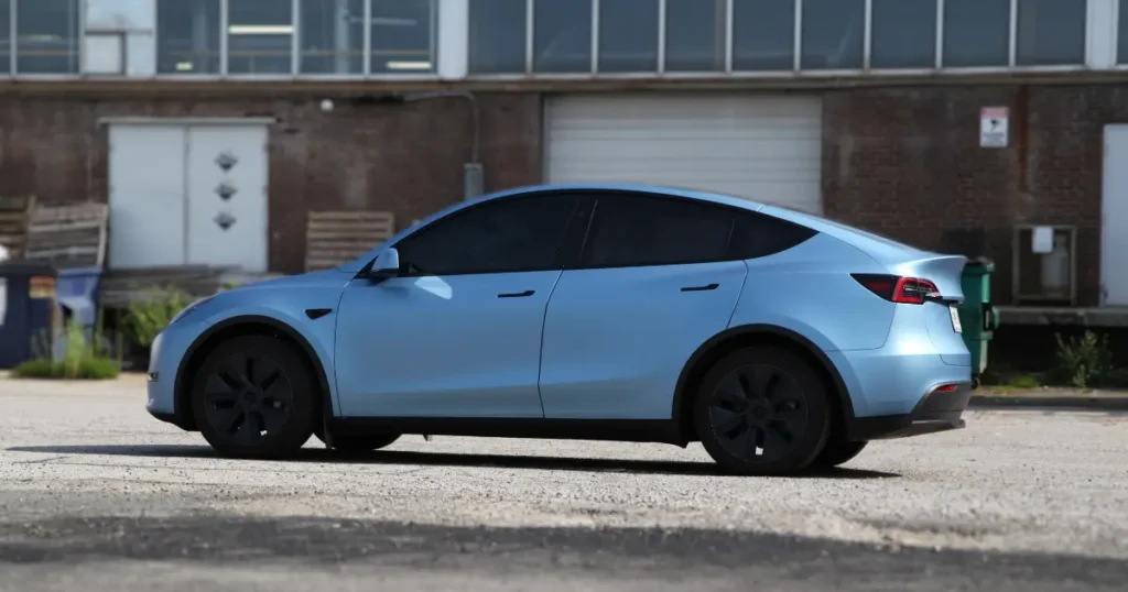 Side view of a Tesla Model Y showcasing a full wrap