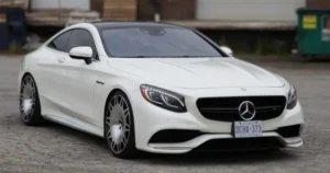 Side-angle view of a Mercedes S63 displaying the Black Carbon car roof