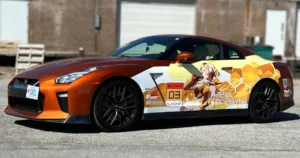 This Nissan GTR features a striking Symphogear-themed partial wrap with Hibiki Tachibana