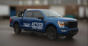 blue truck with white ATYER Logo to showcase DIY vs. Professional truck decal