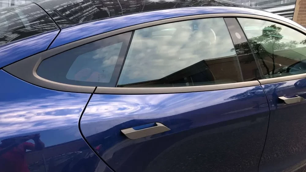 VinylWrapToronto Tesla Brushed Black Model S After Decals Side